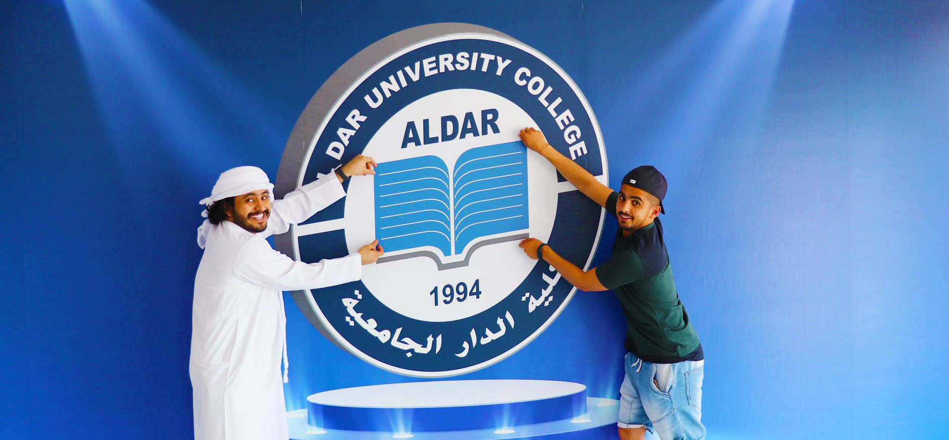 students with logo of Al Dar University College