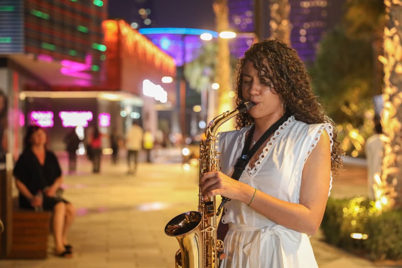a girl playing saxophone